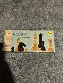 Chess Men With She’s Board 