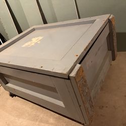Storage chest shipping container style coffee table on wheels