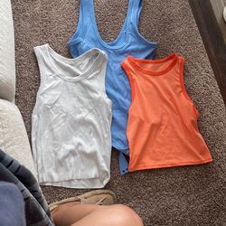 Small Tanks. Blue Tank Is Abercrombie And Size M