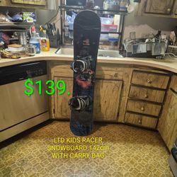 #015... Snowboard LTD 142cm With Bindings And Carry Bag