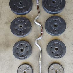 Curl Bar and 110 Lbs of Vinyl Weights 