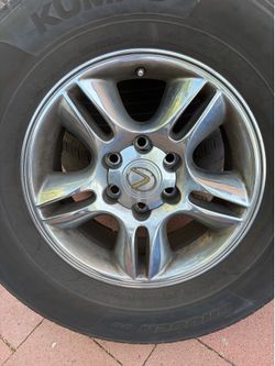 LEXUS GX470 chrome wheels set of 4, center cup.