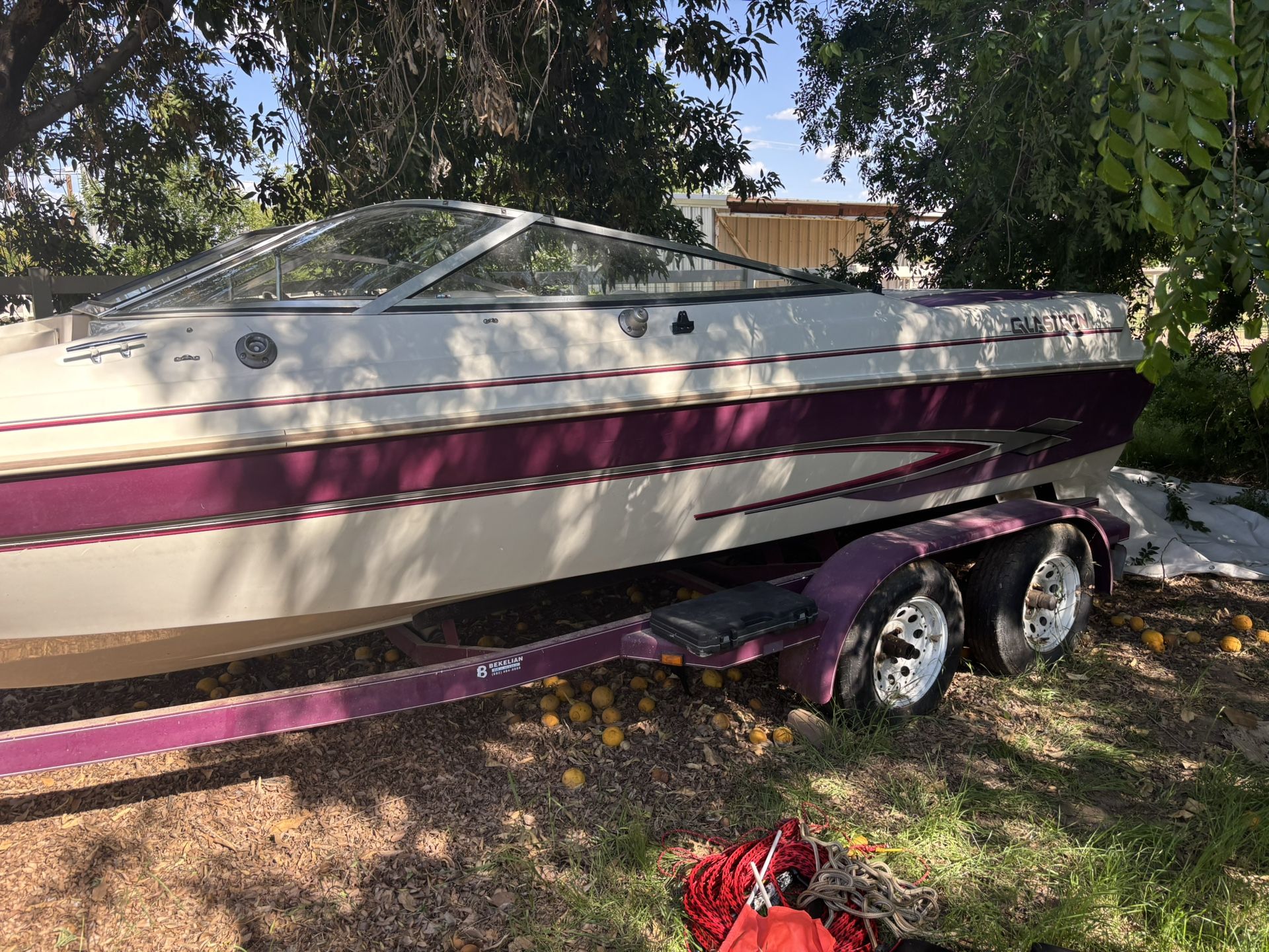 1998 Glastron GS 205. New upholstery, tires, helm, battery, deck, carpet, Bimini top, custom cover and Outdrive rebuilt. Engine is seized. $1000 OBO
