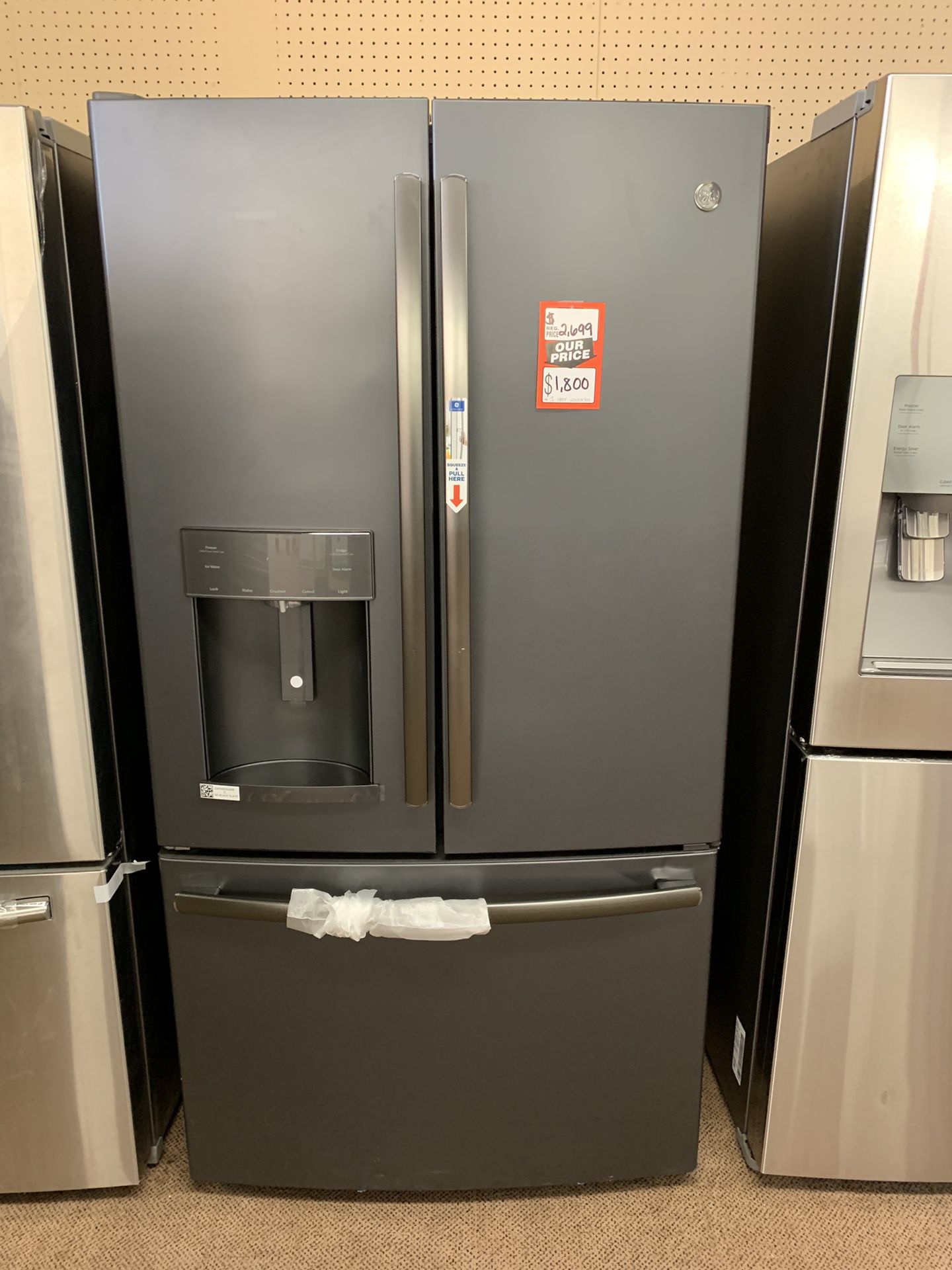 Brand new scratch and dent GE 27.8 cu. ft French door refrigerator with door-indoor Black Slate