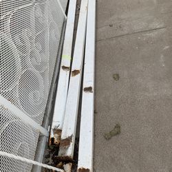 Three metal scrap bars