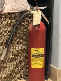vintage full fire extinguisher 