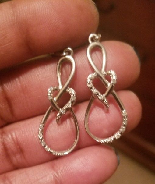 Sterling silver earrings w/diamond accents