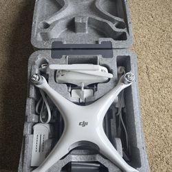 DJI Phantom 4 Quadcopter with 4K Camera, Transmitter Included 
- Great Condition Used
