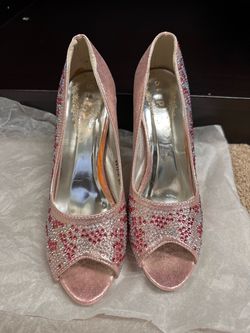 Pink pumps size 8