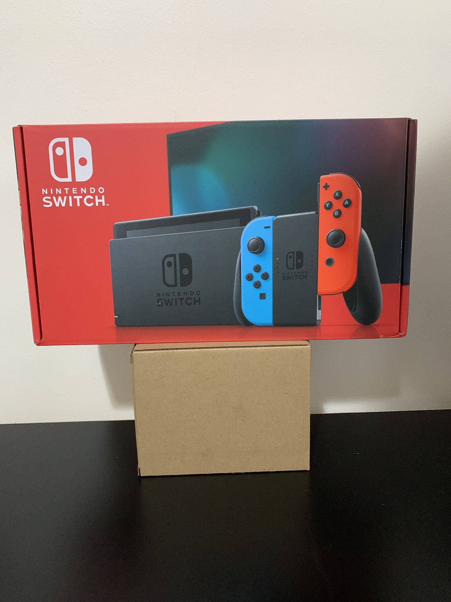 Nintendo Switch with Neon Blue and Neon Red Joy‑Con (Newest Model)