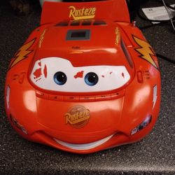 CARS.  LIGHTING MC QUEEN. AM. FM. CD PLAYER. BOOM BOX