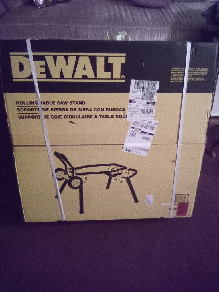 New still sealed in box DeWalt rolling saw table.