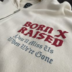 BORN X RAISED STONED ANGEL ZIP -UP HOODIE: CREAM SIZE: LARGE