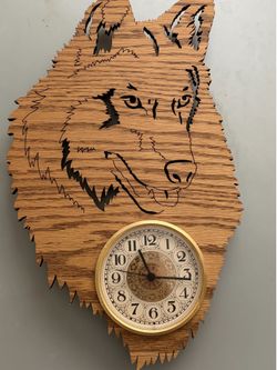 Jigsaw cutout wolf clock