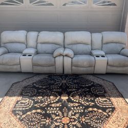 Two Leather Two Seater Power Recliners 