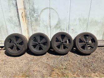 4 Aftermarket rims and tires (Used)