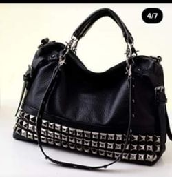 Brand new studded purse . High quality