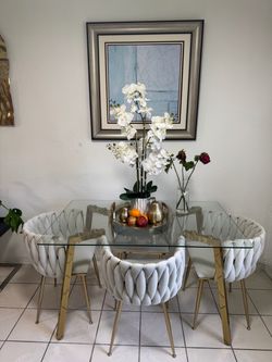 Glass dining table with four chairs, picture, decor