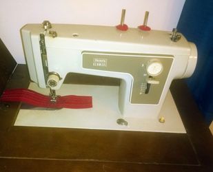 Vintage Sears Kenmore sewing machine and cabinet 1970s