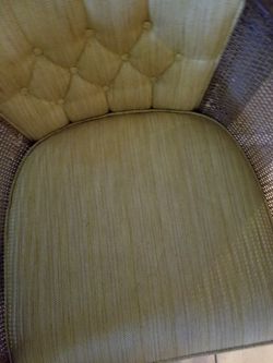 Nice gold barrel back chair on wheels