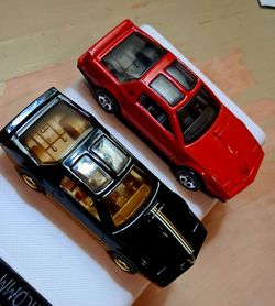 Hot Wheels 1984 Pontiac Firebird x2  CLEAN  Black Gold Retro Stripes  and Solid Red T-tops