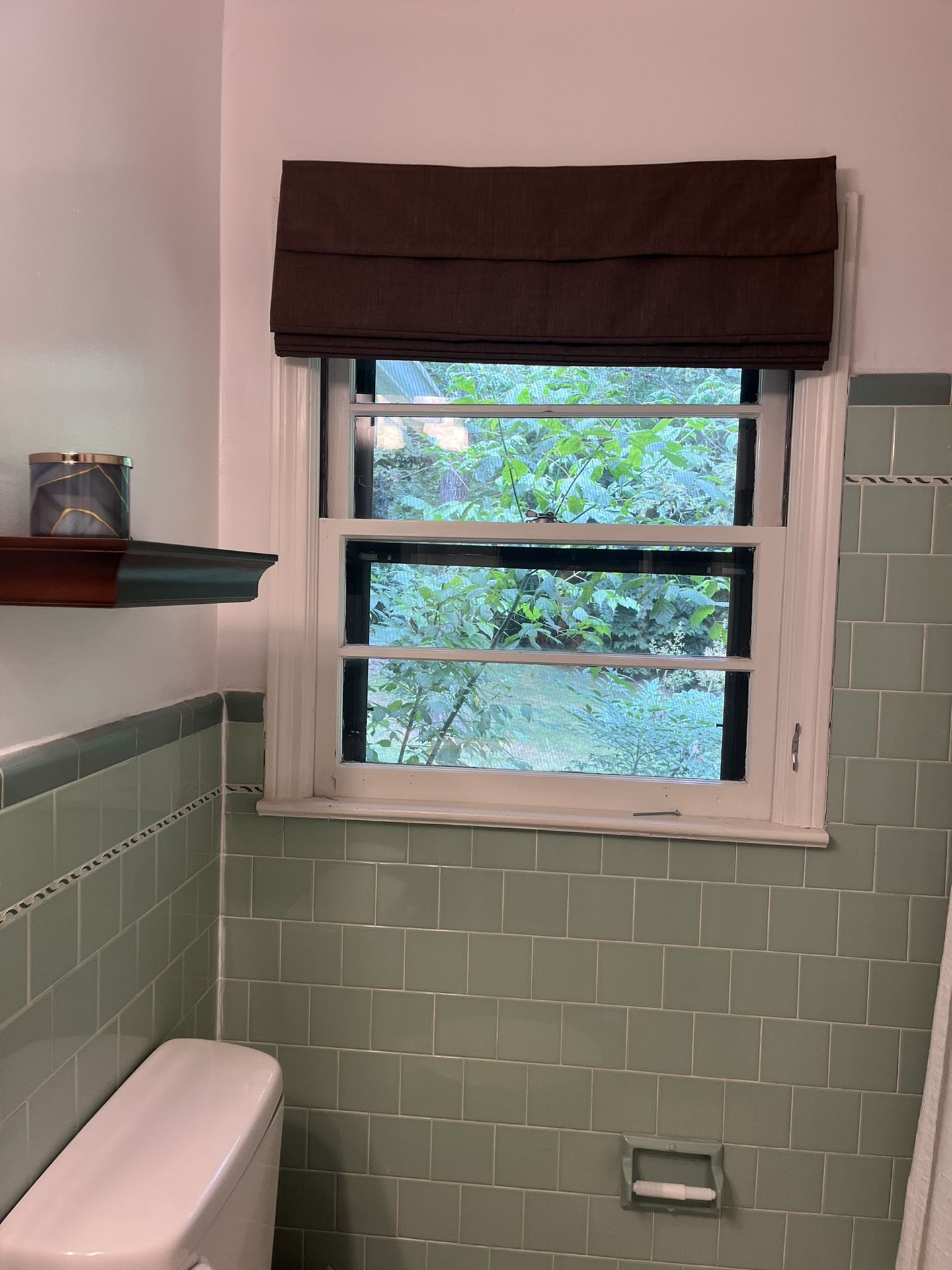 Brown cordless Roman shade 34w X 64h