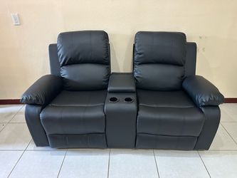 Brand new reclining loveseat — never used, only removed from the box