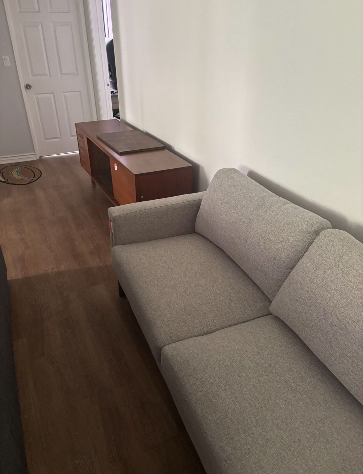 Sectional Couch With A Pillows And An Ottoamn Included