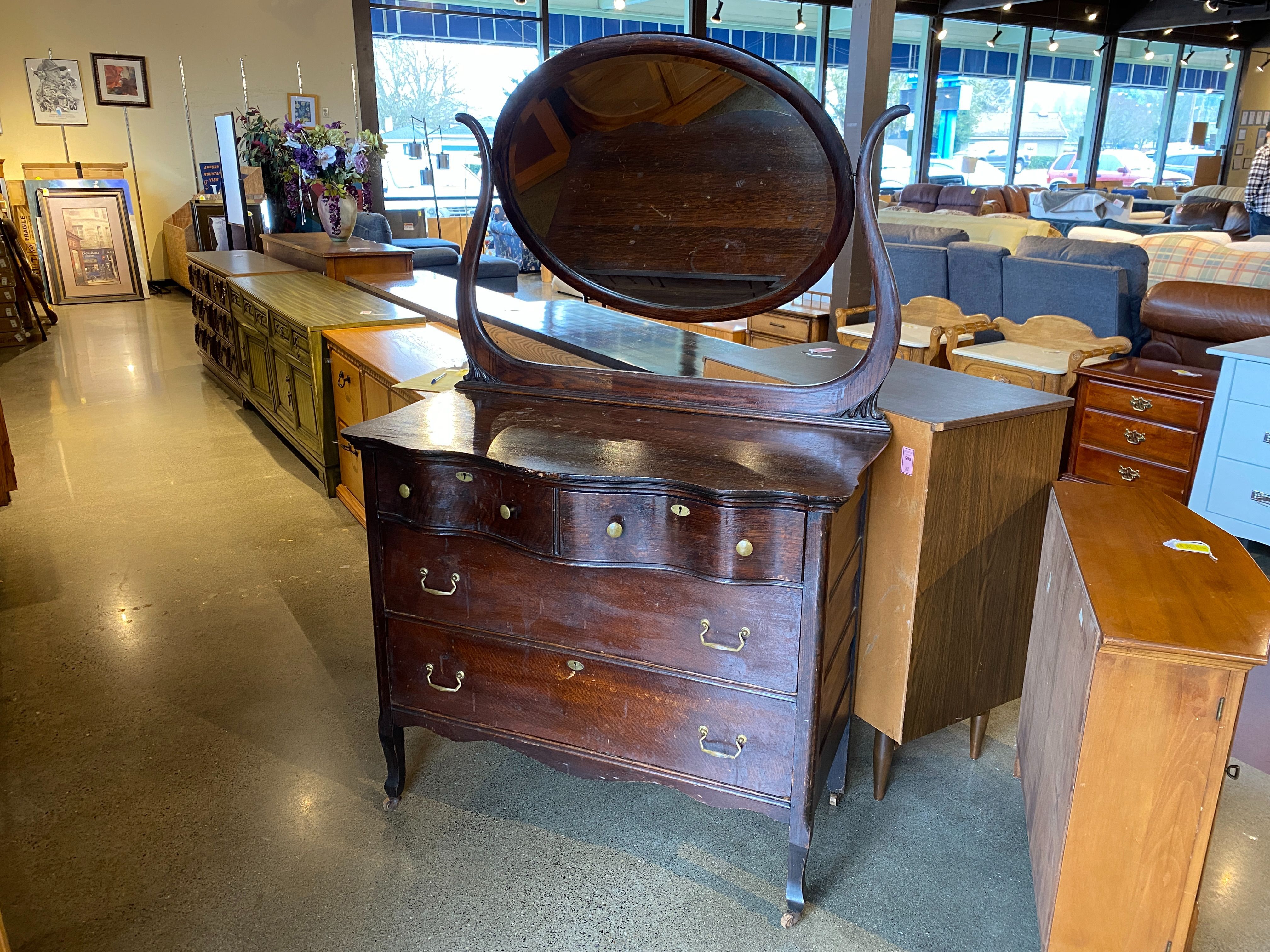 Antique Curved Front Wooden Dresser with Swivel Mirror