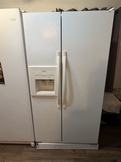 Whirlpool Side-by-Side Refrigerator with Ice Dispenser