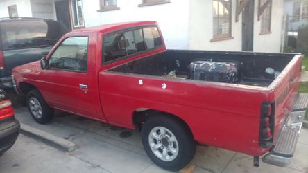 90Nissan truck salvage transmission don't work engine is good mileage don't work have pink slip
