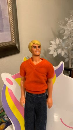 Ken doll his head turns