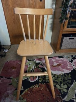 Child’s/Youth chair (too big for high chair, too small for reg. chair)