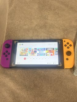NINTENDO SWITCH CONSOLE. 8 GAMES. MARIO BROSS