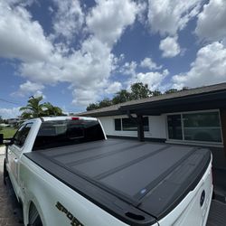 Bed Cover Super Duty 2023-2025 Leer Group Black Hard Folding 4 Panel Tonneau/Bed Cover 6.75ft