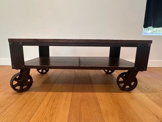 Wooden coffee table with wheels