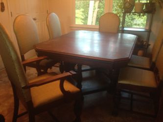 Large wooden table and chairs