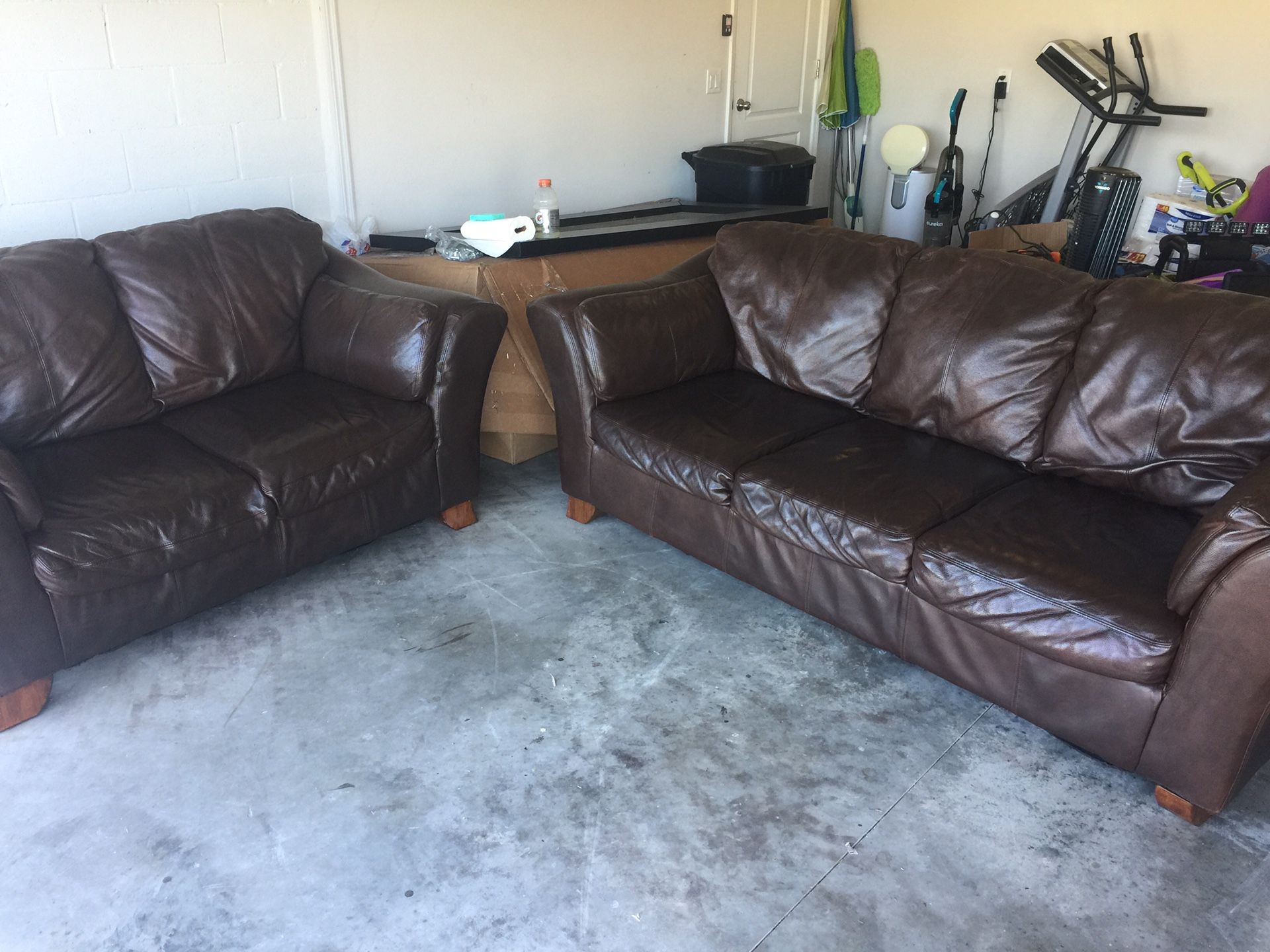 Brown leather sofa and love seat in good condition No tear, no rips
