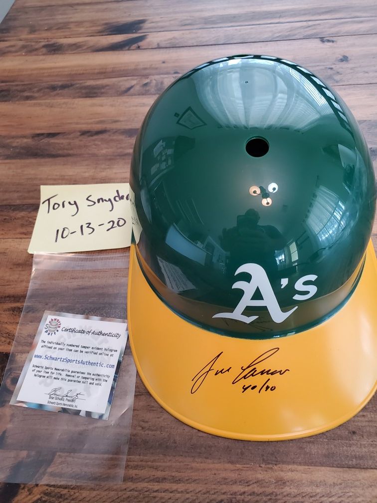 Oakland A's Jose Canseco signed batting helmet with 40/40 inscription. Schwartz COA