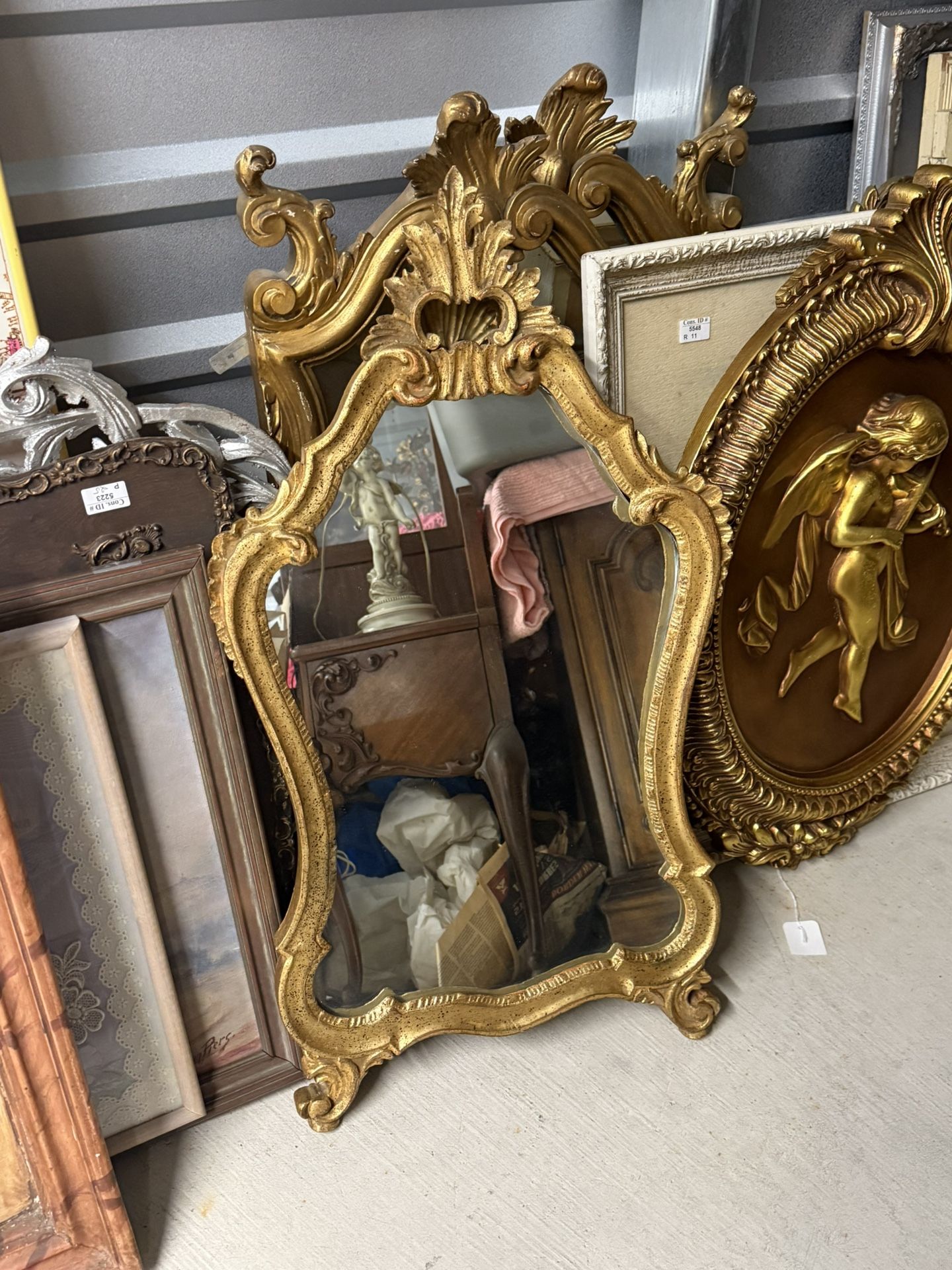Antique Rococo-style carved gold-gilt ornate mirror.