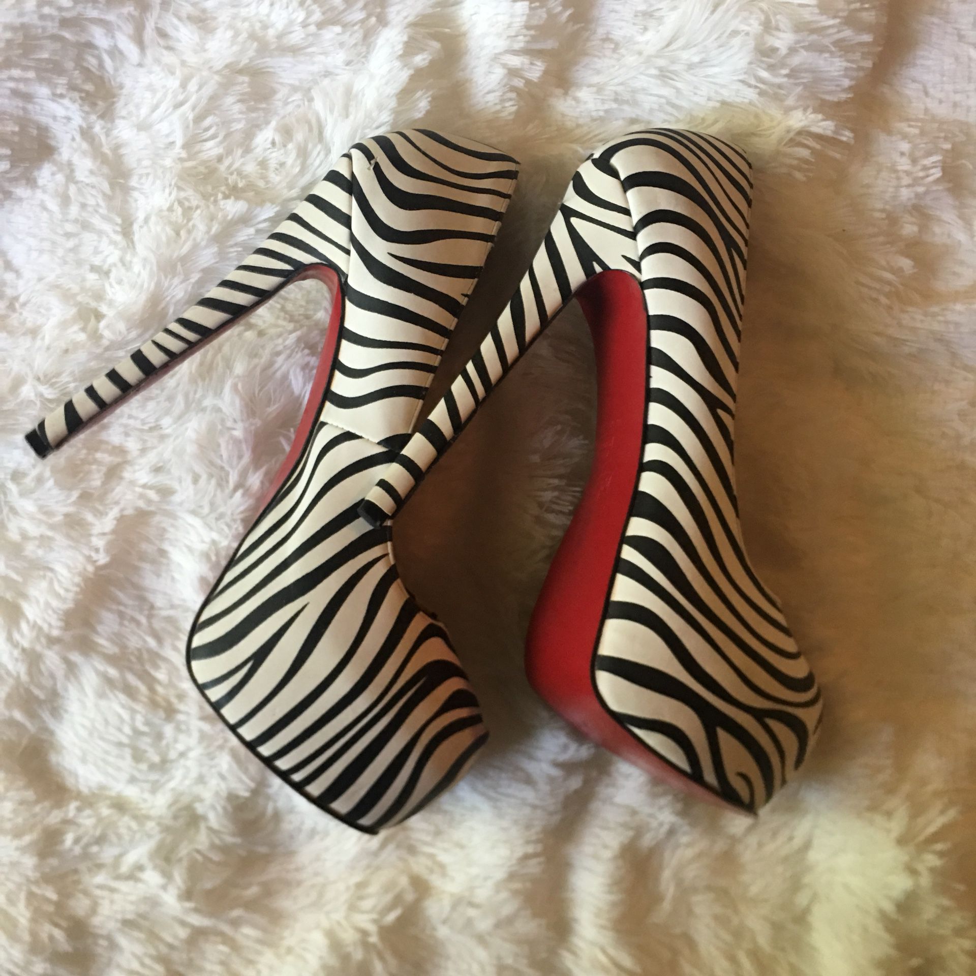 Sexy zebra heels with red bottoms