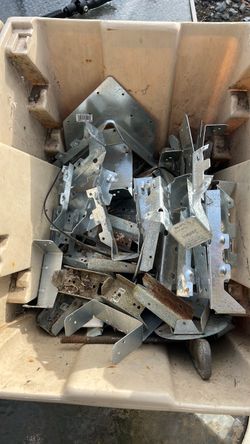Two large tubs of brackets