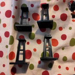 4 Black Lego Stand Pieces