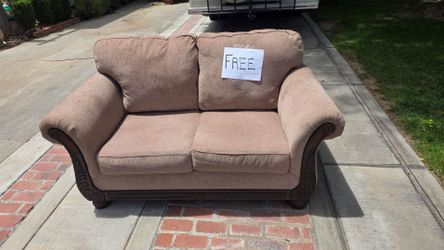 Free Loveseat – Brown Chenille w/ Carved Wood Accents