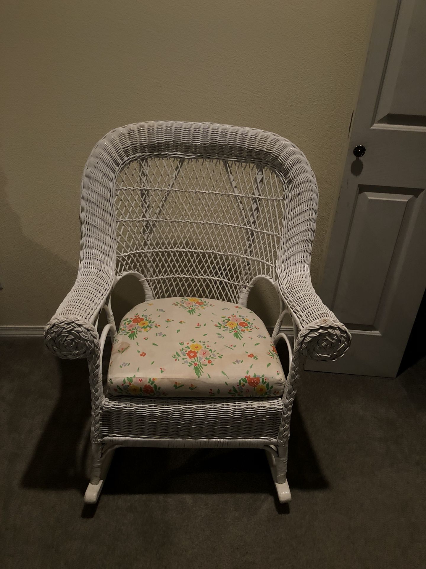 White wicker rocking chair