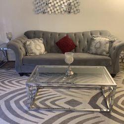 Sofa and loveseat with pillows