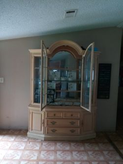 Beige china cabinet