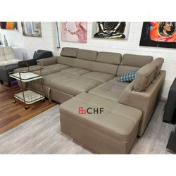 Sectional sofa with storage chaise and pull out bed