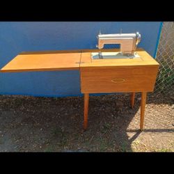 Vintage Sewing Machine with Folding Cabinet Table – Great Condition!

NO POWER CORD/ FOOT PEDAL
