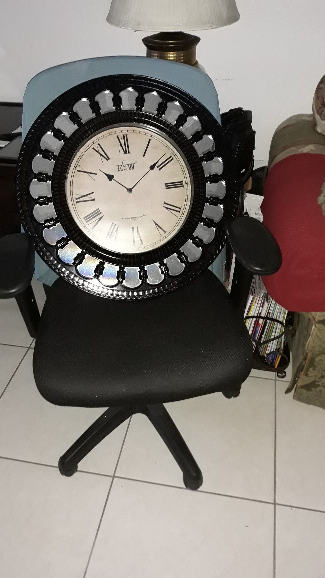 It is a black wall clock mirror with 23 mirrors around for $20.00.
